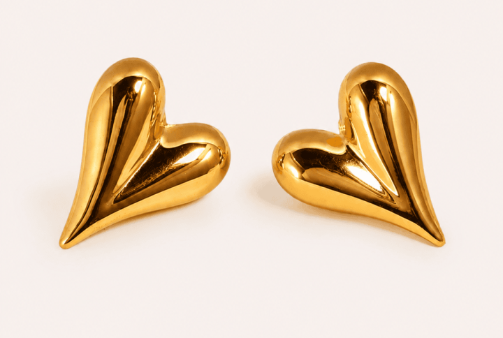 heart earrings, heart-shaped earrings, cute heart earrings, heart earrings for women, heart earrings for girls, gold heart earrings, heart stud earrings, heart hoop earrings, dangling heart earrings, heart drop earrings, small heart earrings, minimalist heart earrings, heart earrings gift, heart earrings for girlfriend, heart earrings for Valentine’s Day, heart earrings near me, heart earrings online, heart jewelry, heart ear jewelry, statement jewellery, minimalist necklace, vintage-inspired necklace, traditional jewellery set, contemporary jewellery, elegant formal accessory, festive jewellery, bridal jewellery, wedding jewellery, engagement jewellery, reception accessory, party wear jewellery, festive necklace set, saree jewellery, lehenga jewellery, anniversary gift, Valentine’s Day gift, bridesmaid jewellery, birthday gift for her, dainty jewelry, minimalist jewelry, everyday jewelry, girlfriend gift jewelry, anniversary jewelry gift, birthday jewelry gift, Valentine's Day jewelry, romantic jewelry gift, cute gift for girlfriend, jewelry gift for women, affordable jewelry for women, layered bracelets for women